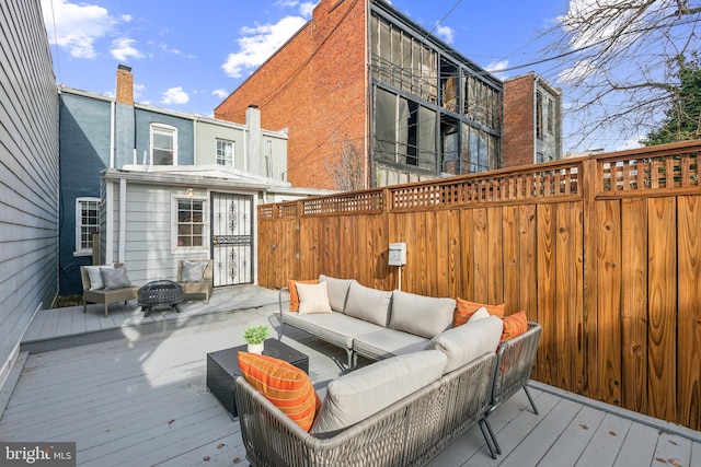 wooden deck featuring outdoor lounge area