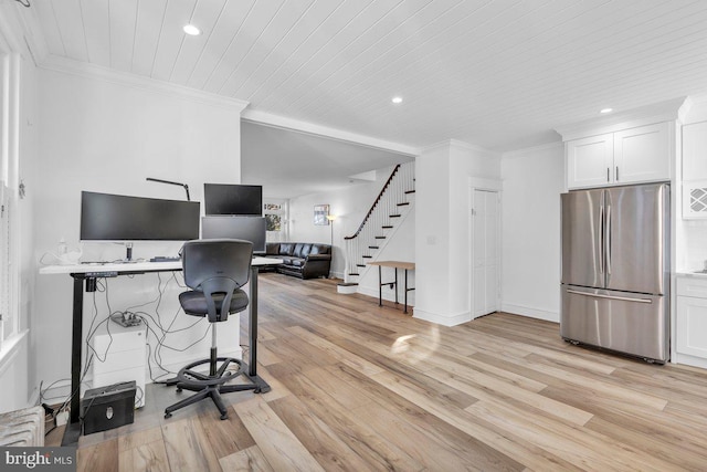 office with wooden ceiling, ornamental molding, and light hardwood / wood-style flooring