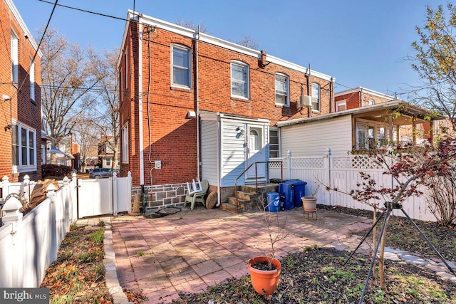 rear view of house featuring a patio area