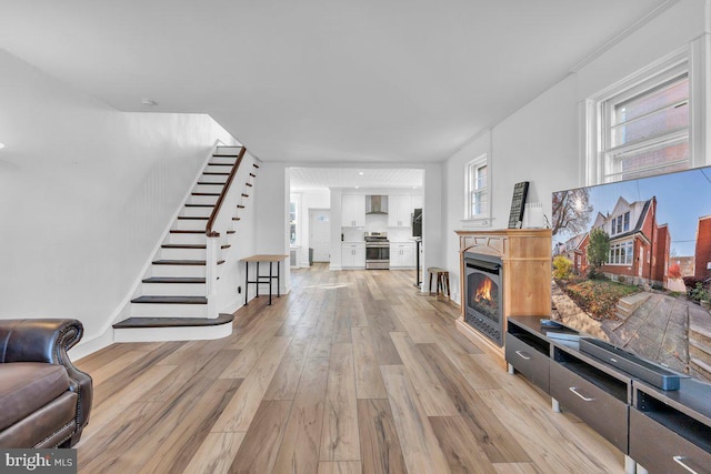 living room with light hardwood / wood-style flooring