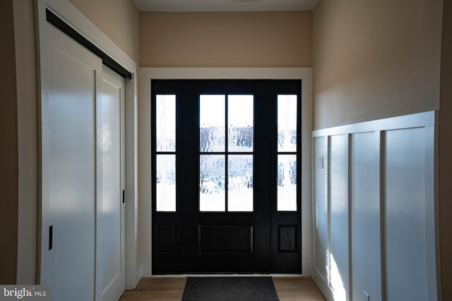 entrance foyer with light wood-type flooring