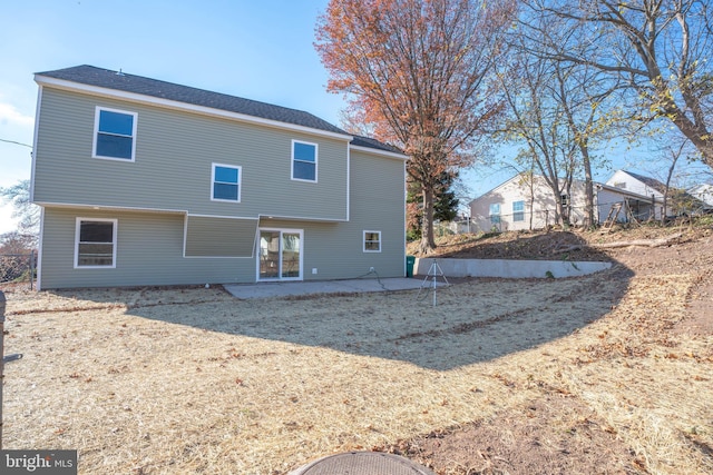 rear view of house with a patio