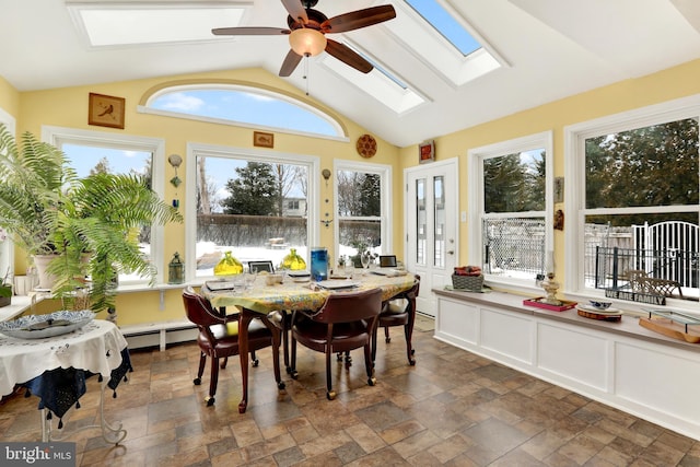 sunroom / solarium featuring lofted ceiling, a baseboard heating unit, and a ceiling fan