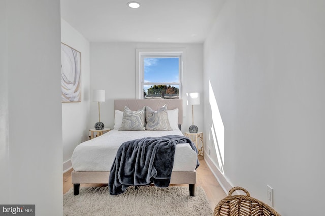 bedroom with light hardwood / wood-style flooring