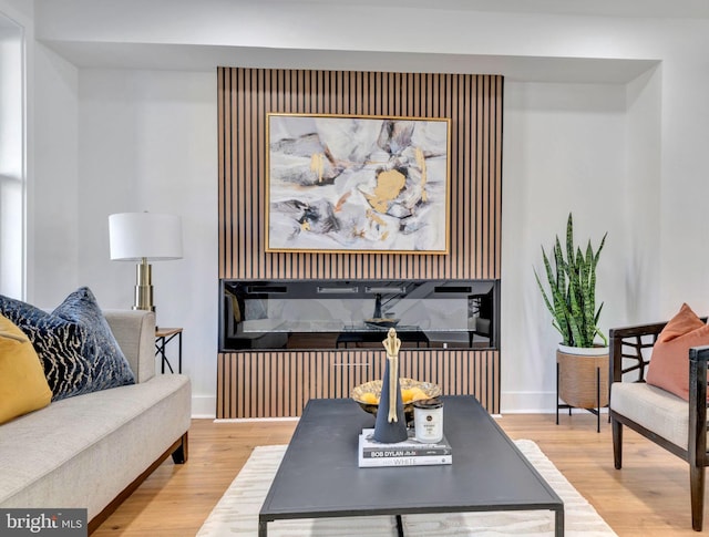 sitting room featuring hardwood / wood-style flooring