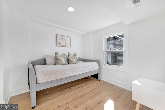 bedroom featuring hardwood / wood-style flooring