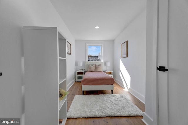 bedroom featuring light hardwood / wood-style flooring