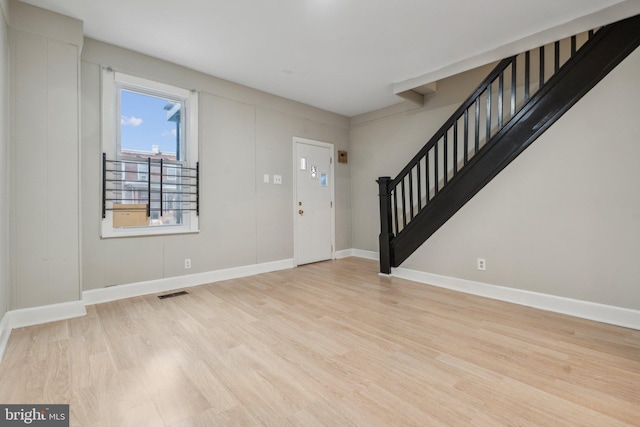 entrance foyer with light hardwood / wood-style floors