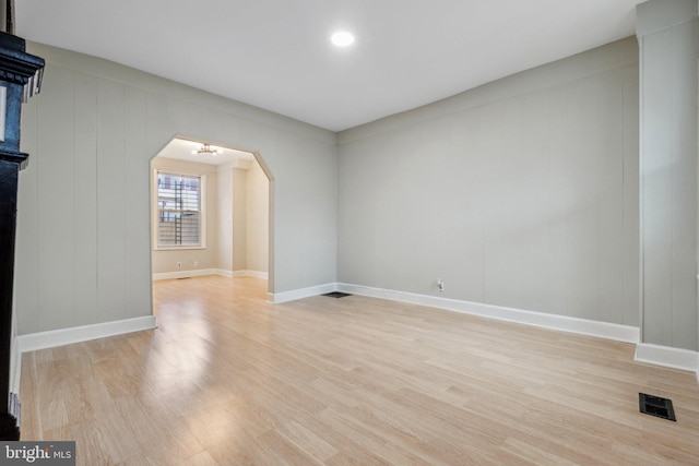 spare room with light hardwood / wood-style floors