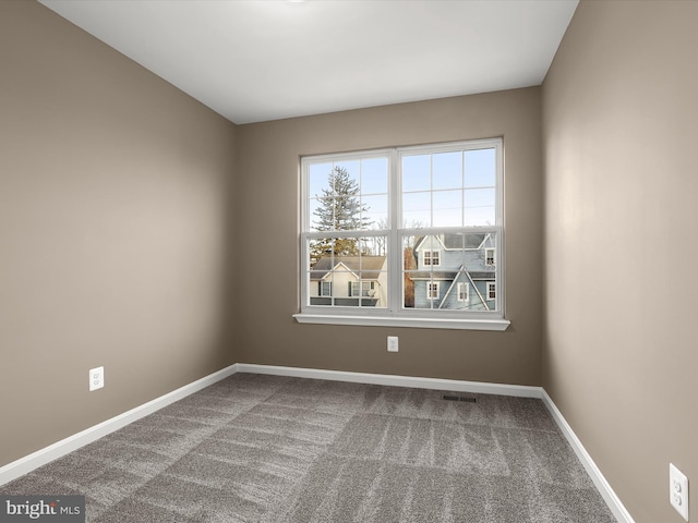 view of carpeted spare room