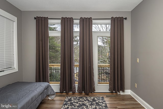 bedroom featuring dark hardwood / wood-style floors