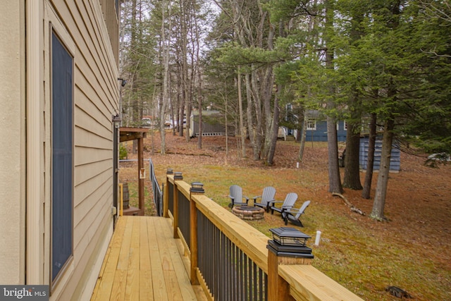 deck featuring a fire pit