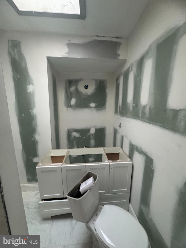 bathroom featuring toilet