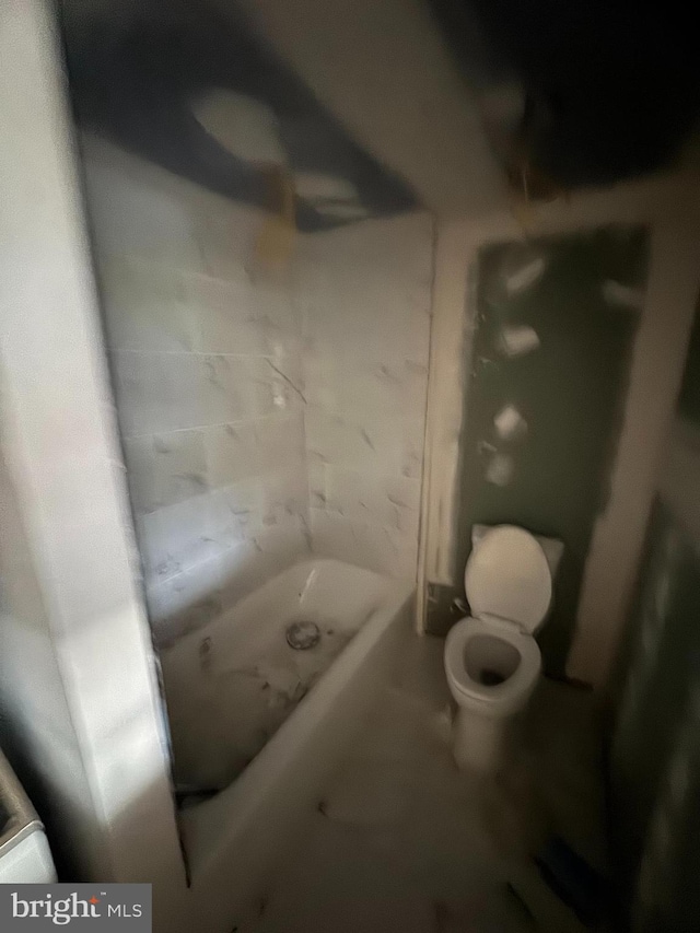 bathroom featuring toilet