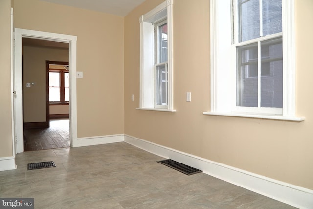 empty room featuring hardwood / wood-style floors