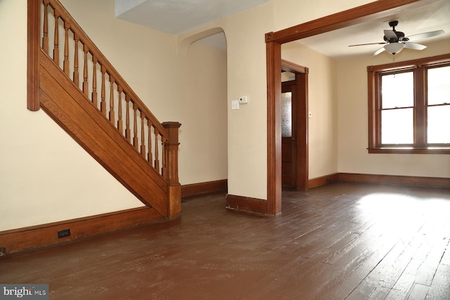 entryway featuring ceiling fan and dark hardwood / wood-style floors