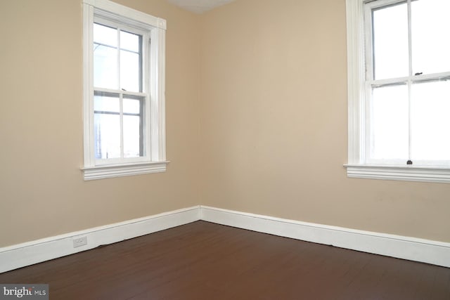 empty room featuring hardwood / wood-style floors