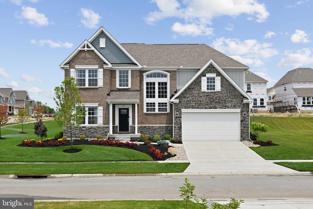 craftsman-style house with a front yard and a garage