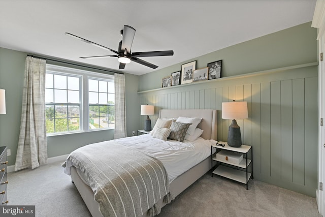 bedroom featuring ceiling fan and light colored carpet