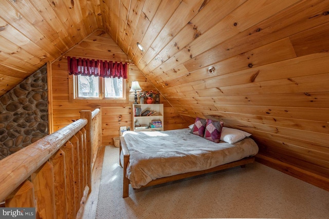 carpeted bedroom with wooden walls, wood ceiling, and lofted ceiling