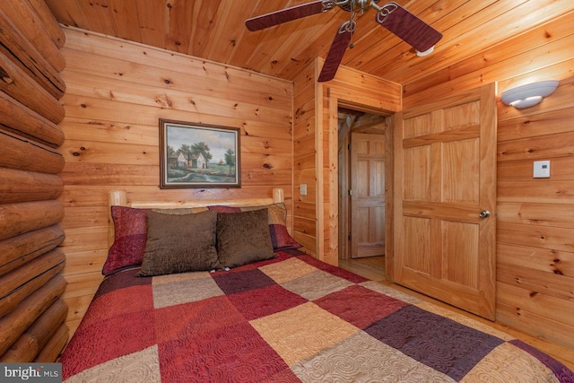 unfurnished bedroom with ceiling fan and wooden ceiling