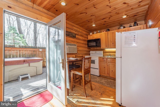 kitchen with white appliances, wooden ceiling, rustic walls, a wall mounted AC, and light hardwood / wood-style floors