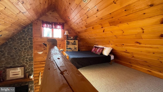 unfurnished bedroom featuring wood walls, carpet, wood ceiling, and vaulted ceiling