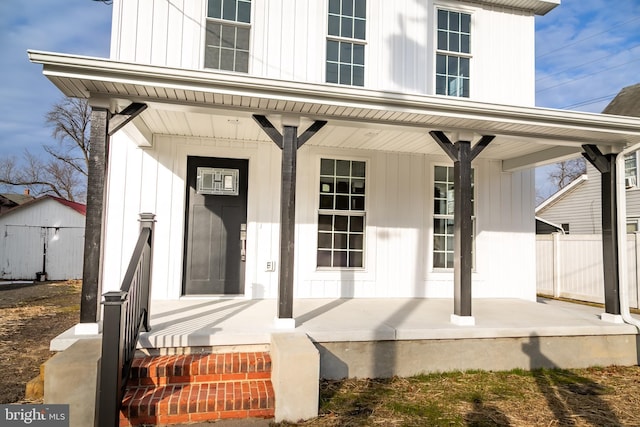 property entrance featuring covered porch