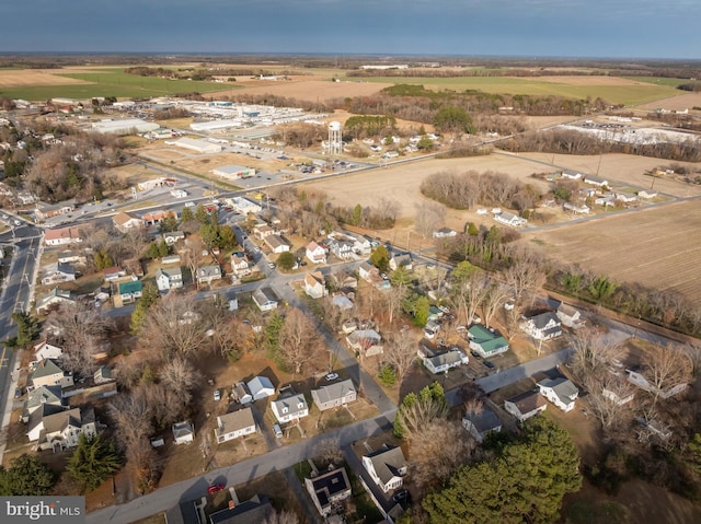 birds eye view of property with a rural view