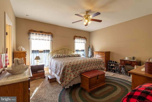 bedroom featuring carpet and ceiling fan