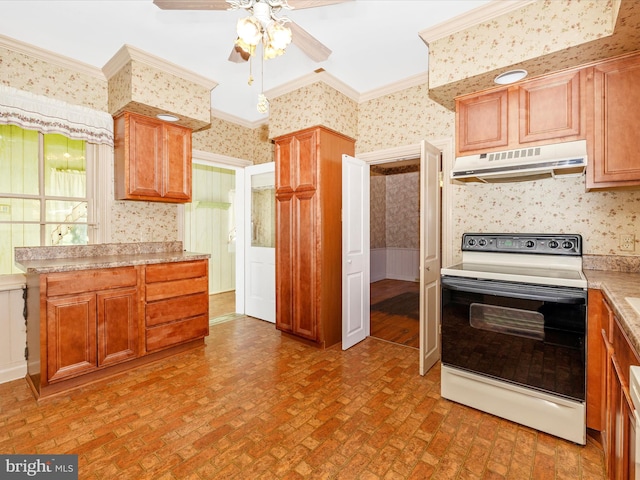 kitchen with brick floor, crown molding, white electric range oven, under cabinet range hood, and wallpapered walls