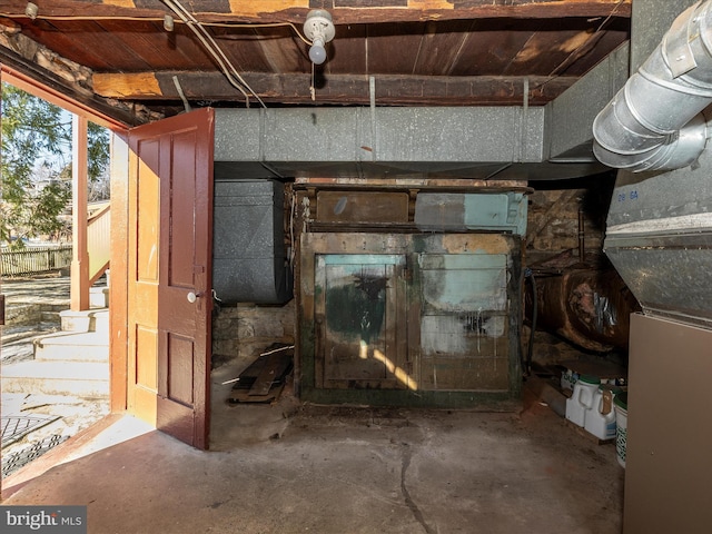 miscellaneous room featuring unfinished concrete flooring