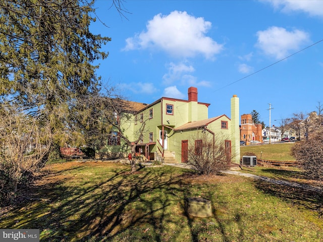 view of yard featuring central AC