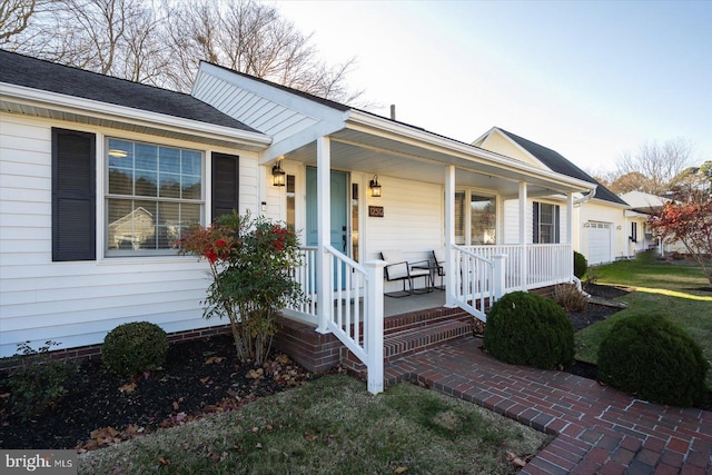 ranch-style house with a front yard and a porch