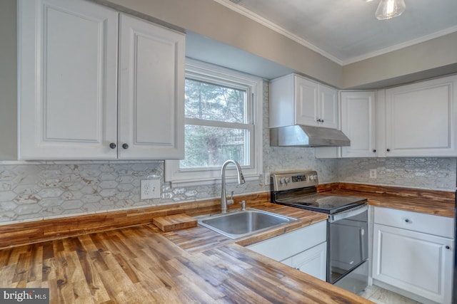 kitchen with butcher block countertops, white cabinetry, stainless steel range with electric cooktop, and sink