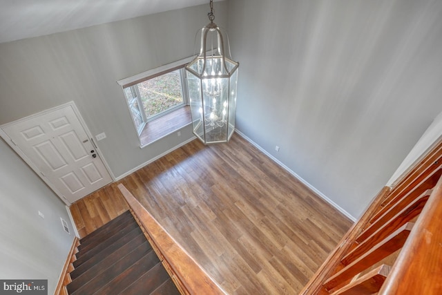 unfurnished dining area with wood-type flooring