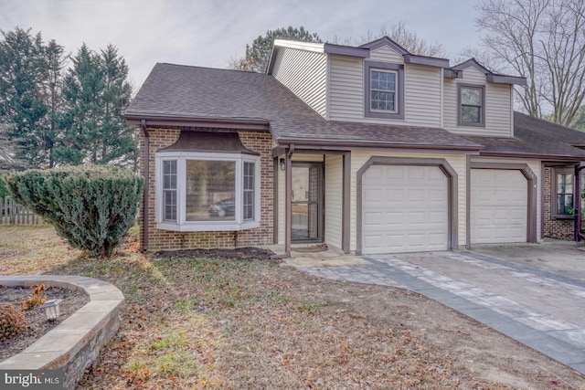 view of front of property with a garage