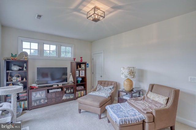 sitting room with light carpet