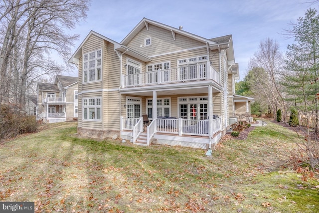 view of front of home featuring a front yard and a porch