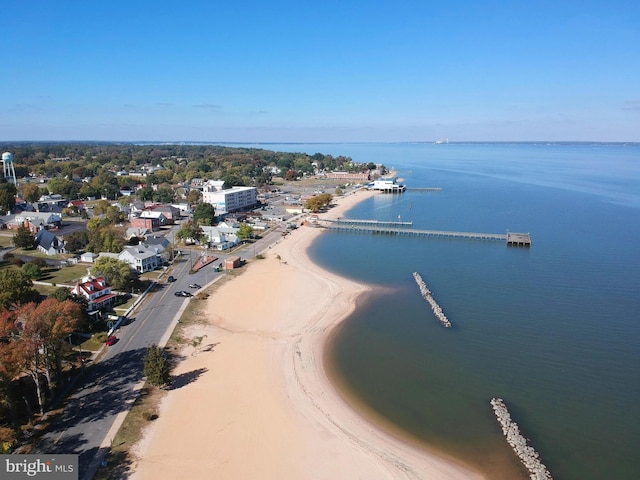 aerial view featuring a water view and a view of the beach