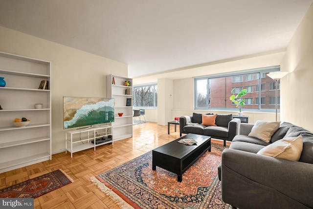 living room featuring light parquet floors