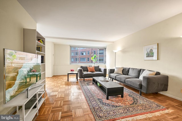 living room featuring light parquet flooring