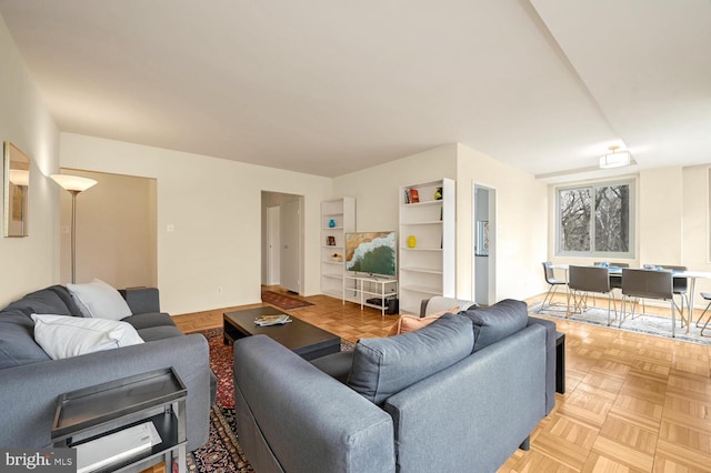 living room with light parquet flooring