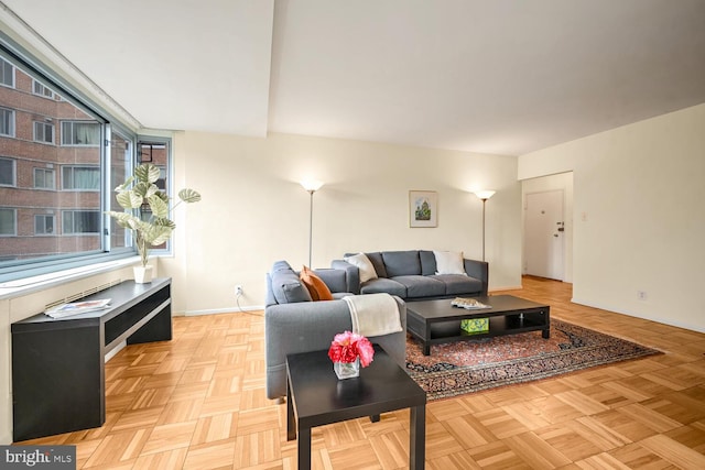 living room featuring light parquet flooring