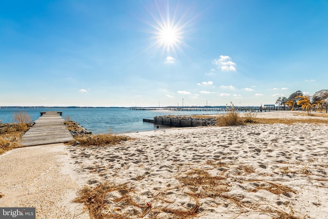 property view of water featuring a beach view