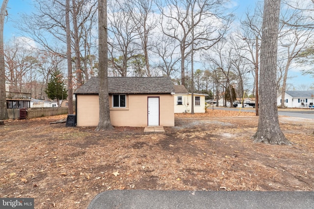 view of outbuilding with cooling unit