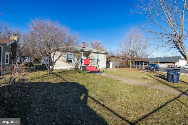 exterior space featuring a front yard