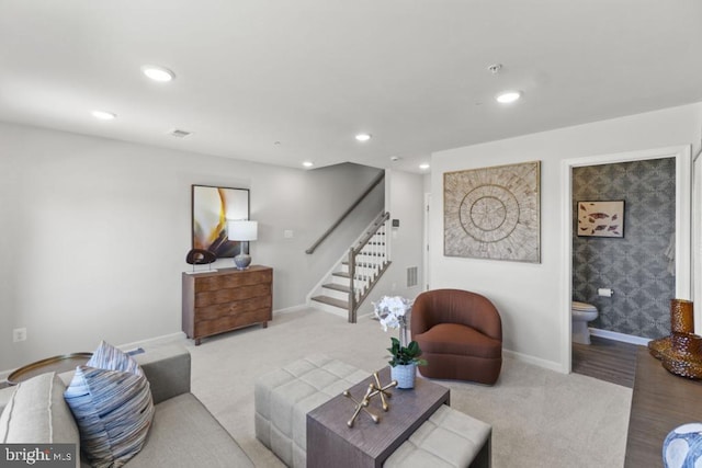 living room with light hardwood / wood-style flooring