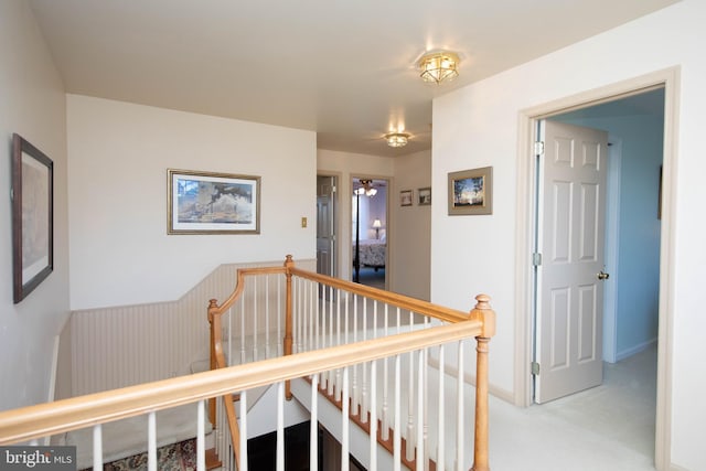 hallway featuring carpet