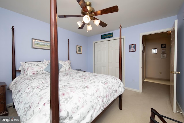 bedroom with carpet flooring, ceiling fan, and a closet